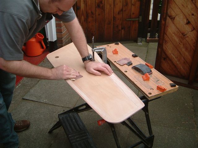 Sanding the centerboard.