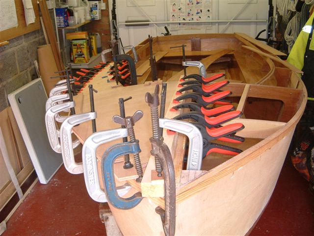 A total of 38 clamps hold down the starboard deck. NO PINS!!