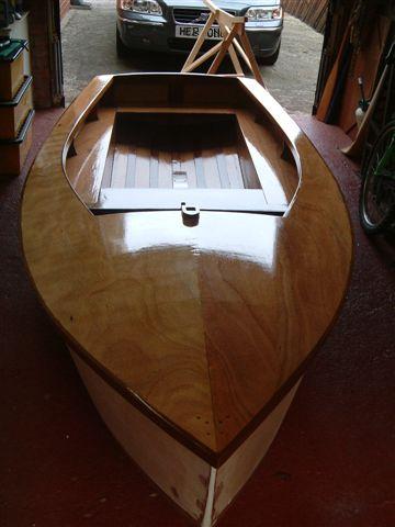 Last varnish before being flipped over to work on the hull.