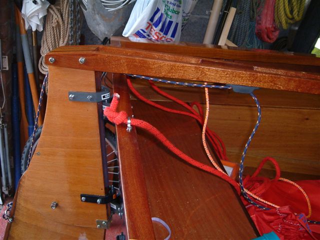 Jammers fitted underneath the tiller to secure the rudder control lines.